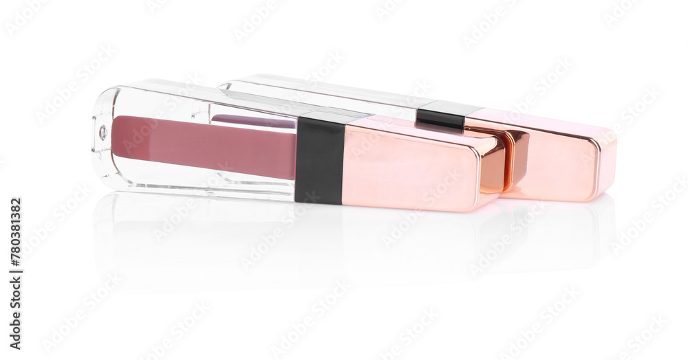 Two lip glosses isolated on white. Cosmetic products Two lip glosses isolated on white. Cosmetic products