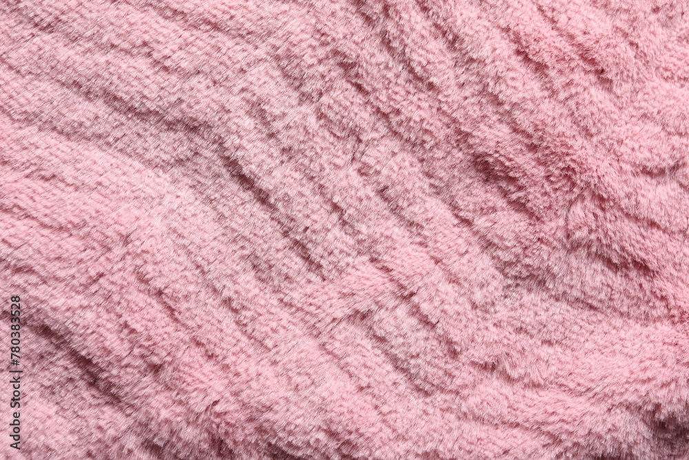 Texture of pink faux fur as background, top view Texture of pink faux fur as background, top view