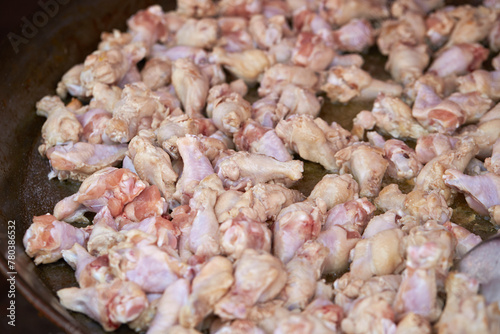 raw chicken legs in a pan  © mnimage