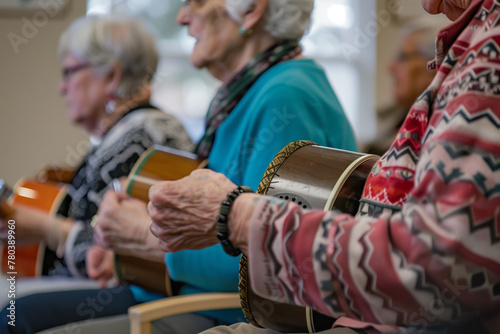 Music therapy sessions in seniors community center, where seniors play on musical instruments © Arlessa