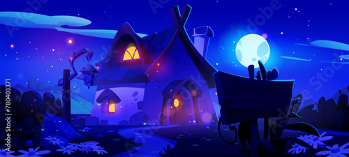 Summer countryside landscape with house at night. Starry sky with full moon in evening and mystery light from gnome home window. Fairytale cottage in darkness of midnight. Magic dwarf hut design photo
