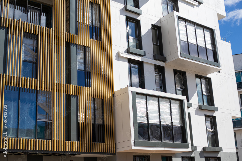 Obraz premium Cityscape of a residential area with modern apartment buildings, new sustainable urban landscape in the city