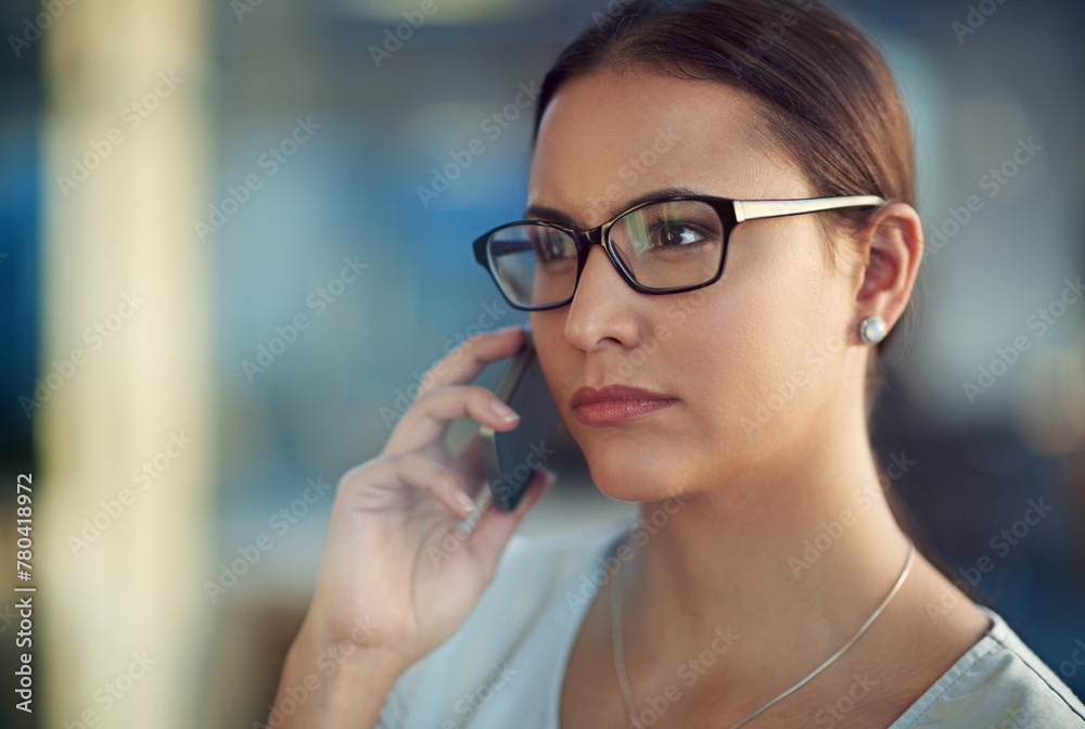 Woman, serious and phone call at office for business with communication, talking and graphic design. Workplace, agency job and mobile in hand for speaking conversation, internet and creative company