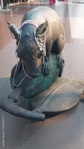 The Statue of Rat, or Mushika Vahana, is a symbol of wisdom and humility in Hindu mythology. photo