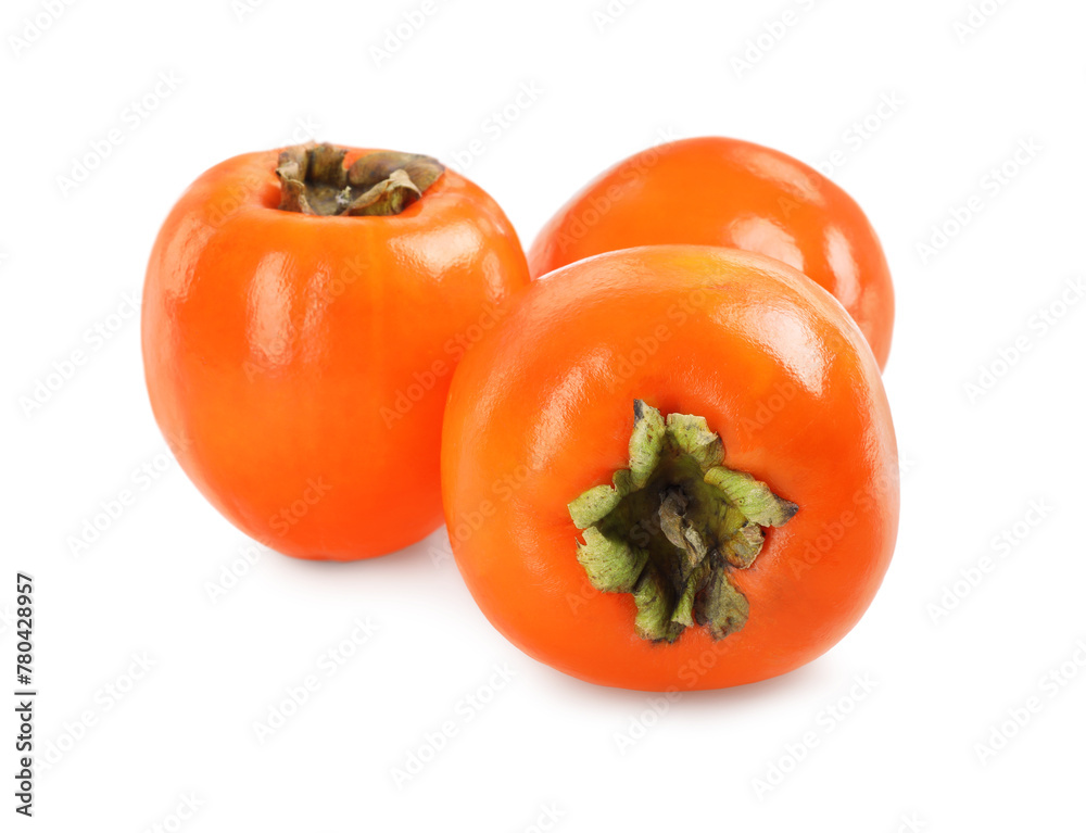 Delicious ripe juicy persimmons isolated on white Delicious ripe juicy persimmons isolated on white