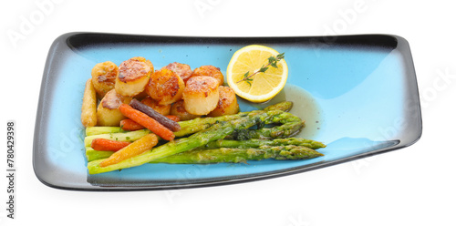 Delicious fried scallops with asparagus, vegetables, lemon and thyme isolated on white