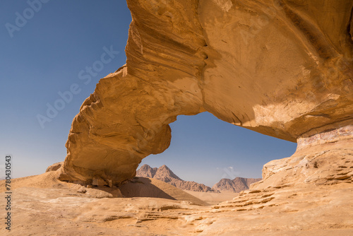 Jebel Kharraz, huge rock arch, Wadi Rum, Jordan photo