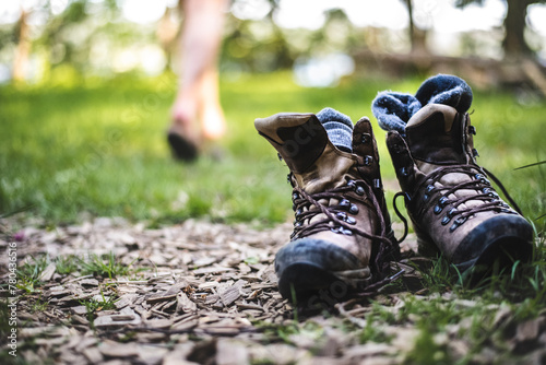 Close-up of hiking boots on land photo