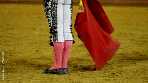 Spanish Matador Facing A Bull Inside The Arena