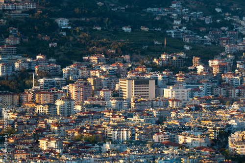 Panoramic view from Alanya Castle on city Buildings during sunset