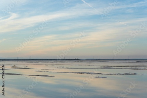 Clouds reflecting on the peaceful lake surface