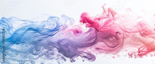 Colorful powder in the water, creating an abstract pattern with swirls of pink and blue on white background. The vibrant colors create intricate patterns reminiscent of sand painting