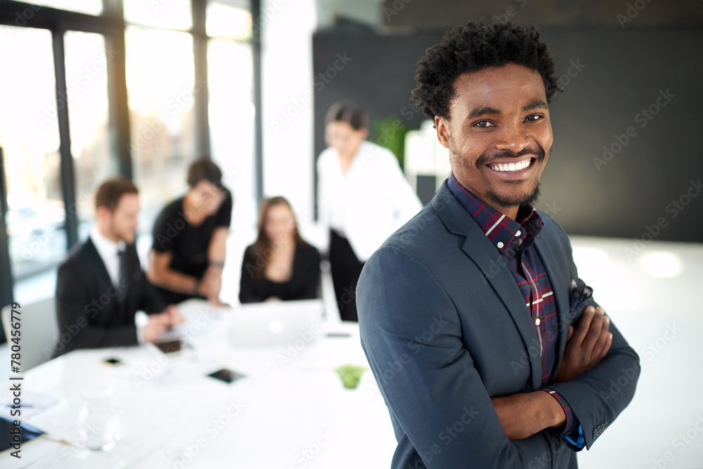 Professional, portrait of man in office with pride for leader or manager and team in meeting. Confidence, smile and businessman with business people, collaboration and work on marketing strategy