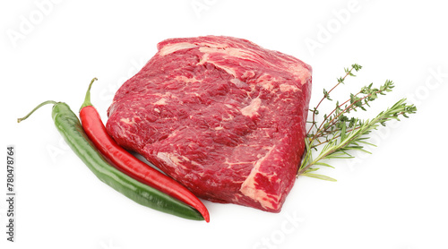 Fresh raw beef cut, herbs and peppers isolated on white