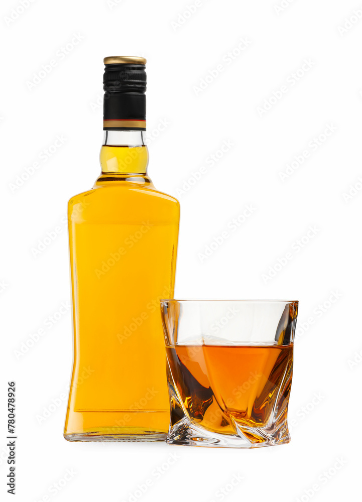 Glass and bottle of whiskey isolated on white Glass and bottle of whiskey isolated on white