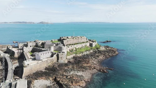 Castle Cornet,flight over on clear sunny day,historic castle in St Peter Port Guernsey with calm clear sea and views over Jethou,Herm and Sark photo