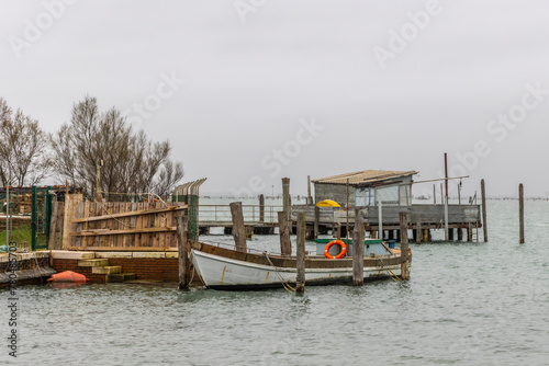 Obraz na płótnie small fishing boat on island Pellestrina in Venice lagoon, Italy w salonie