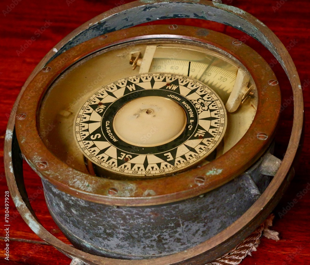 Old compass. The Pascual Flores is pailebote or goleta ship build in ...