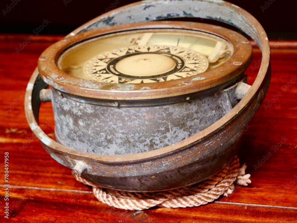 Old compass. The Pascual Flores is pailebote or goleta ship build in ...