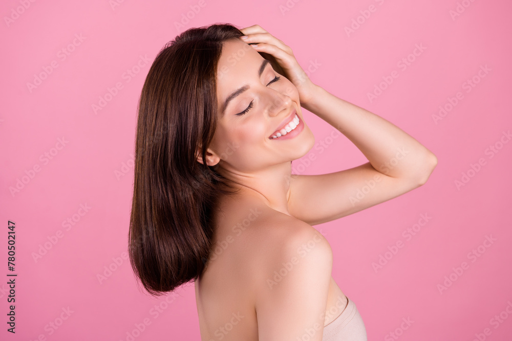 Photo of aesthetic attractive lady touch hair after applying shampoo for strong hairstyle isolated over pastel color background Photo of aesthetic attractive lady touch hair after applying shampoo for strong hairstyle isolated over pastel color background