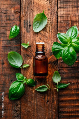 Basil essential oil in a bottle. Selective focus.