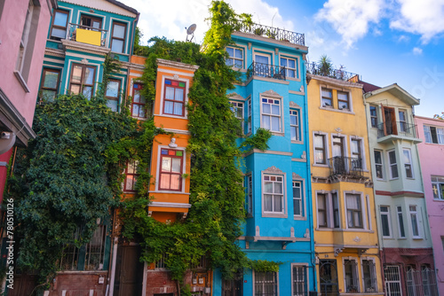Colorful houses on the Balat are popular among tourists on a sunny day. Balat is a quarter in Istanbul's Fatih district. Istanbul, Turkey photo