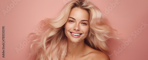 portrait of a blonde beautiful woman on a pink background abstract 