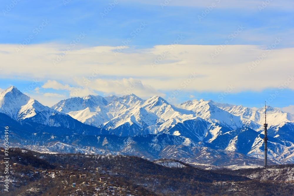 Obraz premium The winter view of the Almaty mountains taken from the surrounding hills