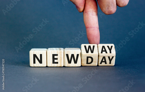 New day and way symbol. Concept word New day New way on beautiful wooden cubes. Beautiful grey table grey background. Businessman hand. Business new day and way concept. Copy space.