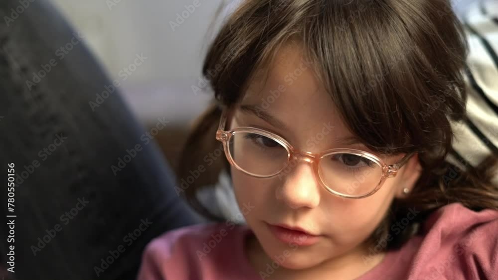 Little girl with glasses talking slowly Little girl with glasses talking slowly