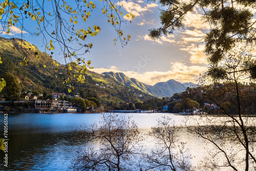 Lake in the mountains. Bhimtal Lake is a lake in the town of Bhimtal, in the Indian state of Uttarakhand, India, with a masonry dam built in 1883 creating the storage facility.