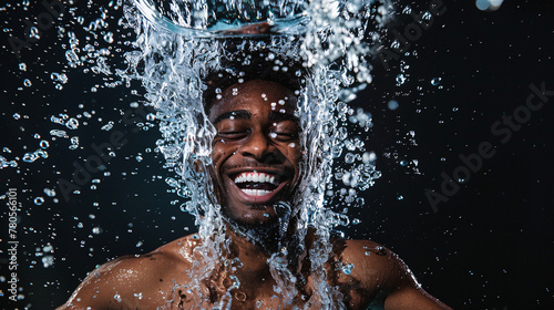 a full body view of male model, jumped in clear water