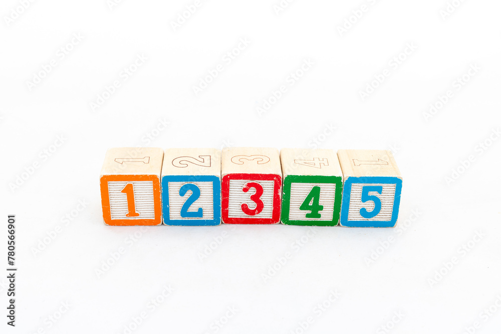 Row of toy building blocks with numbers from 1 up to 5 isolated on white background. Row of toy building blocks with numbers from 1 up to 5 isolated on white background.
