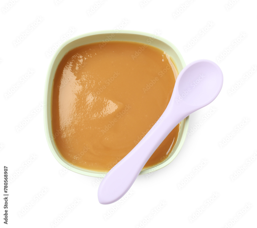 Tasty baby food in bowl and spoon isolated on white, top view Tasty baby food in bowl and spoon isolated on white, top view