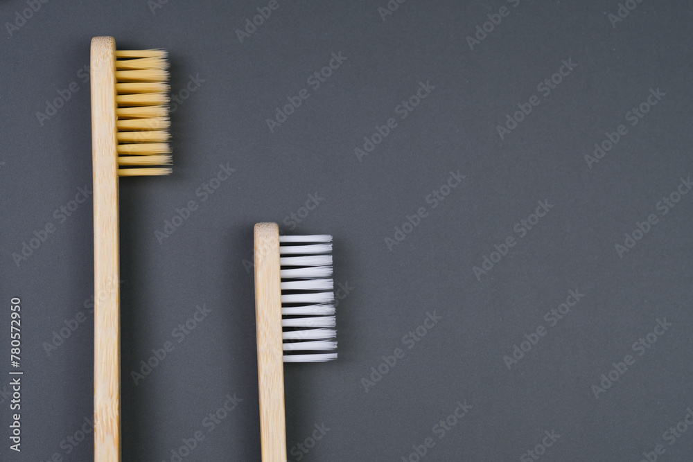 Two Toothbrushes are Together on the grey background. Health Care, Stomatology banner 