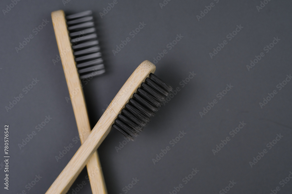 Two Toothbrushes on Gray Surface Two Toothbrushes on Gray Surface