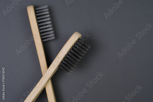 Two Toothbrushes on Gray Surface photo