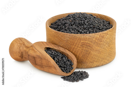 black sesame seeds in wooden bowl and scoop isolated on white background with full depth of field