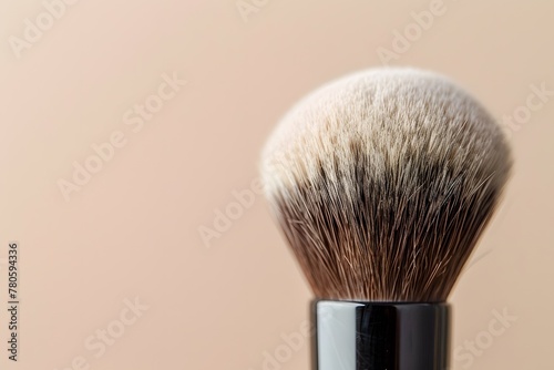 Professional Black Makeup Brush with Brown Bristles on Elegant Beige Background