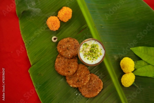 Navratri Upwas Thali / Fasting food platter on banana leaf background