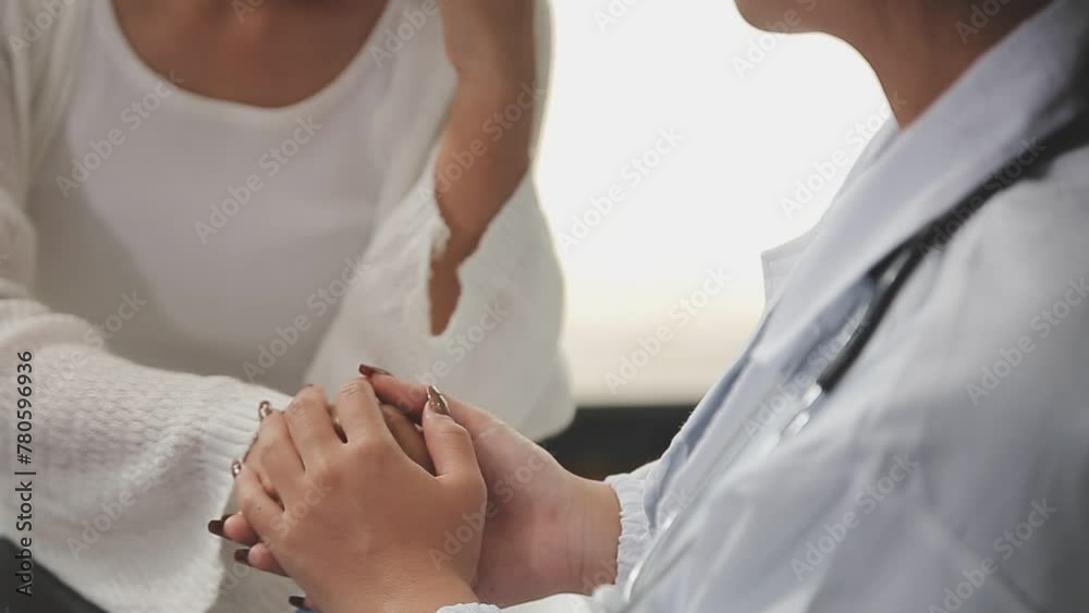 Young woman doctor nurse wear white medical uniform holding hand of senior old female grandmother patient having disease health problem give support help empathy and comfort concept, close up view Young woman doctor nurse wear white medical uniform holding hand of senior old female grandmother patient having disease health problem give support help empathy and comfort concept, close up view