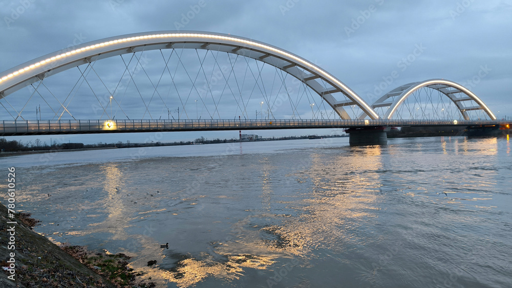 panoramic view of the bridge over Danube river in Novi sad, reflected in the water surface panoramic view of the bridge over Danube river in Novi sad, reflected in the water surface