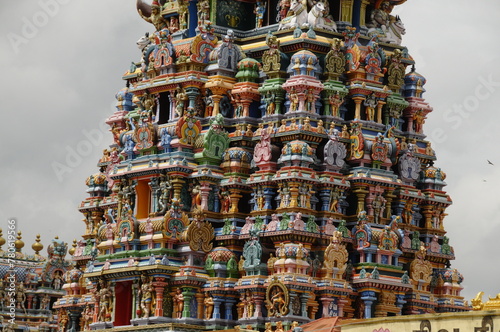 Detail of colourful Gopuram in Meenakshi Temple, Madurai, Tamil Nadu, India photo
