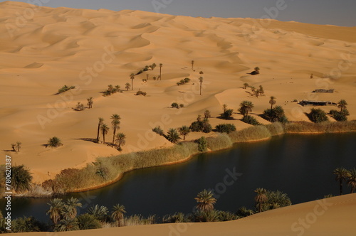 Picturesque orange Dunes of Ubari Oasis, Sahara Desert, Libya photo