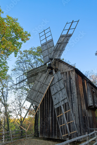 Historic windmill exhibited as part of a traditional Romanian village life inside Dimitrie Gusti National Village Museum, Bucharest, Romania