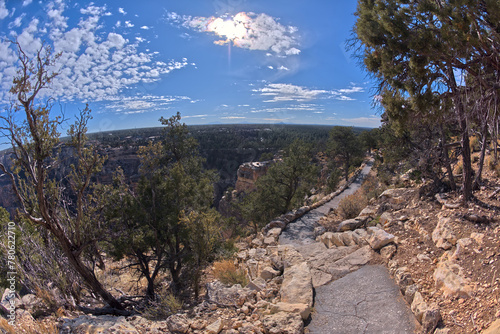 The paved rim trail along the cliffs of Grand Canyon South Rim between the village and Trailview Overlook Vista, Grand Canyon, UNESCO World Heritage Site, Arizona, United States of America photo