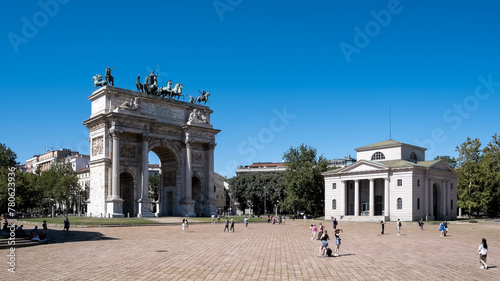 View of Porta Sempione (Simplon Gate) and Arco della Pace (Arch of Peace), 19th century triumphal arch with Roman roots, Milan, Lombardy, Italy photo