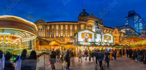 View of Christmas Market stalls in Victoria Square at dusk, Birmingham, West Midlands, England, United Kingdom photo