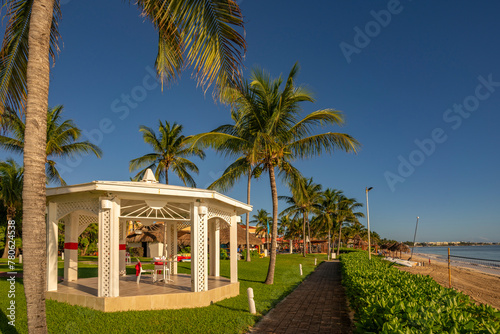 View of hotel wedding bandstand and beach near Puerto Morelos, Caribbean Coast, Yucatan Peninsula, Mexico photo