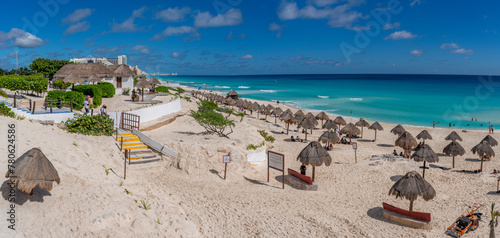 View of long white sandy beach at Playa Delfines, Hotel Zone, Cancun, Caribbean Coast, Yucatan Peninsula, Mexico photo